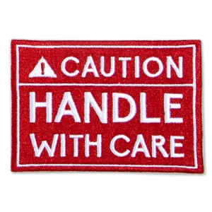 Oliver Thomas Badge - Caution